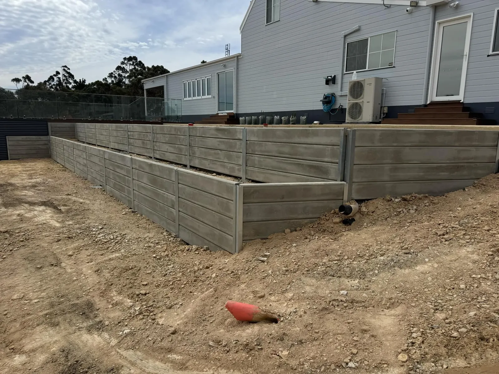 Completed concrete sleeper retaining wall