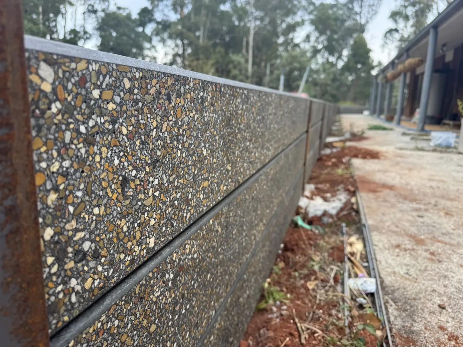 Exposed aggregate retaining wall detail